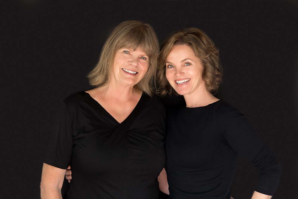 photo: Alie and Hejsa Christensen wearing black blouses 